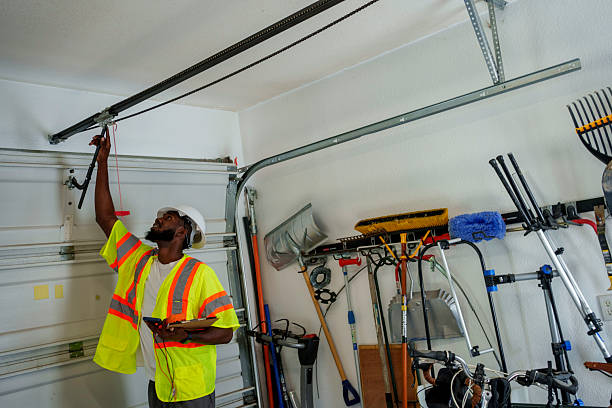 Professional Garage Door Installation technician working in Reedsport, OR